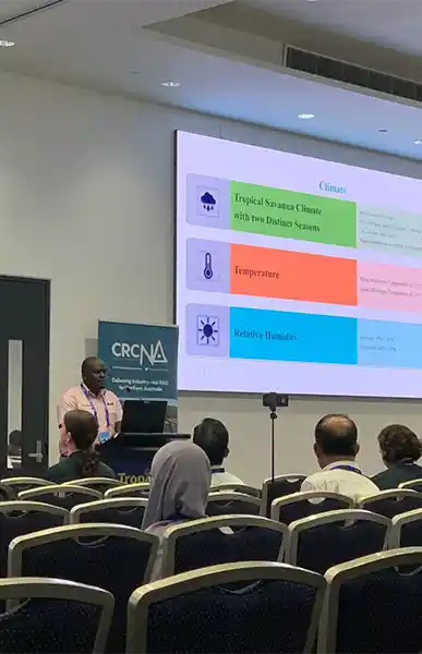 Dr. Induni Vijaya Kumar (left) and Dr. Edward Mwando (right) presenting at the 2025 TropAg Conference in Brisbane. Photo by Mrs. Jyothi Bhandari.
