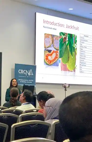 Dr. Induni Vijaya Kumar (left) and Dr. Edward Mwando (right) presenting at the 2025 TropAg Conference in Brisbane. Photo by Mrs. Jyothi Bhandari.